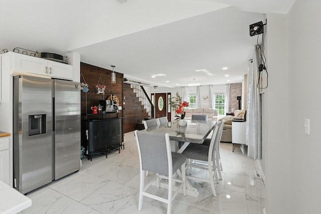 399 N Main St, Salem, NH 03079 - dining area featuring light marble finish flooring, stairway, and recessed lighting