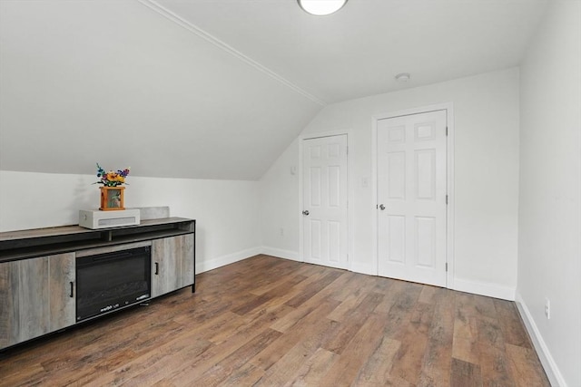 399 N Main St, Salem, NH 03079 - bonus room with dark wood-type flooring, vaulted ceiling, and baseboards