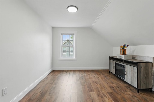 399 N Main St, Salem, NH 03079 - bonus room with dark wood-style floors, vaulted ceiling, and baseboards