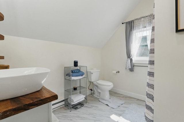 399 N Main St, Salem, NH 03079 - full bathroom featuring lofted ceiling, marble finish floors, toilet, vanity, and a baseboard radiator