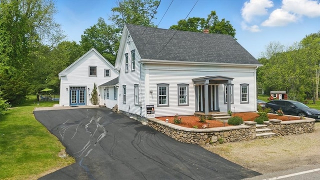 399 N Main St, Salem, NH 03079 - view of front facade featuring a chimney and a shingled roof