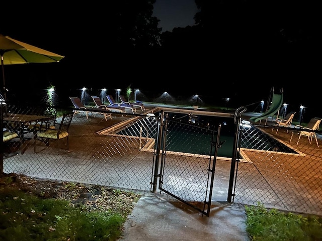 399 N Main St, Salem, NH 03079 - pool at twilight featuring a gate