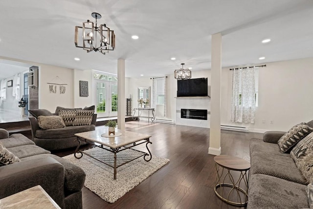 399 N Main St, Salem, NH 03079 - living area featuring a chandelier, a baseboard radiator, recessed lighting, baseboards, and dark wood-style flooring