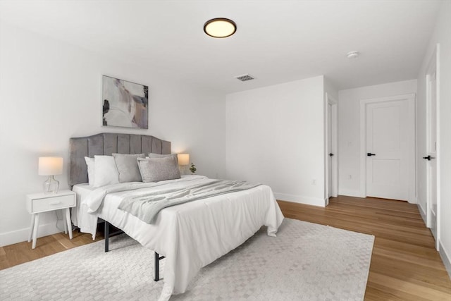 bedroom featuring light hardwood / wood-style flooring