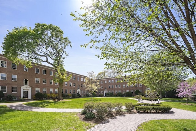 view of community featuring a yard