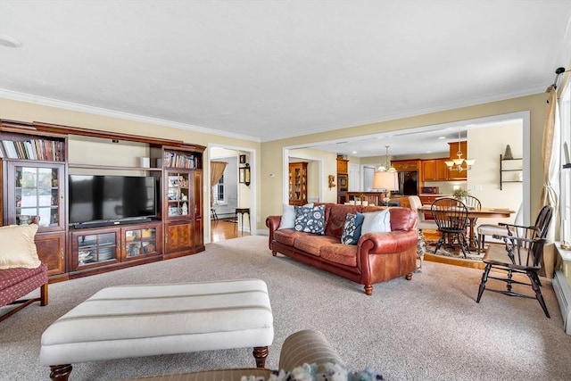 living room featuring light colored carpet and ornamental molding
