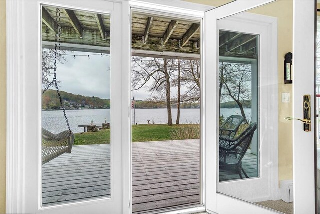 entryway with a water view