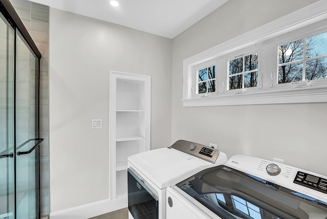 laundry area featuring washing machine and dryer