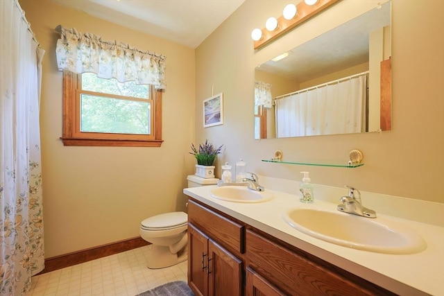 15 Amys Way, Franklin, MA 02038 - full bathroom with double vanity, toilet, baseboards, and a shower with shower curtain