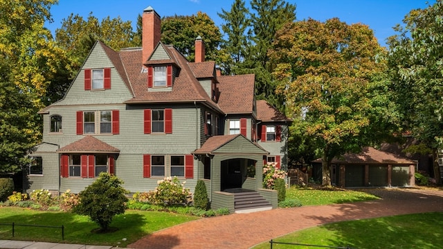 victorian house with a front lawn