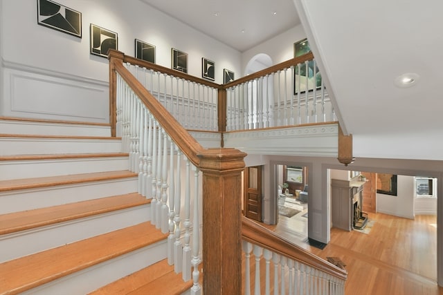 staircase featuring hardwood / wood-style floors