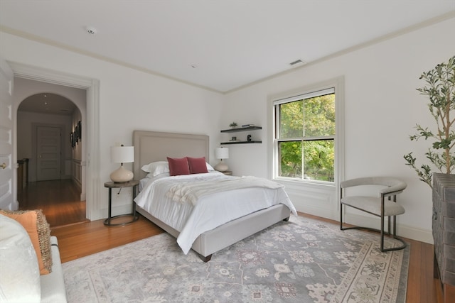 bedroom featuring hardwood / wood-style floors