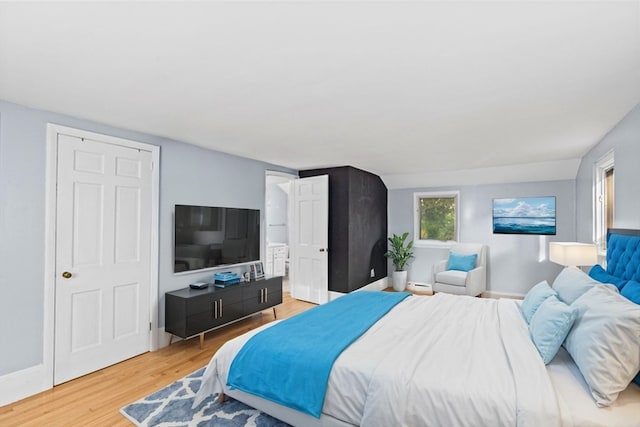 bedroom featuring hardwood / wood-style floors