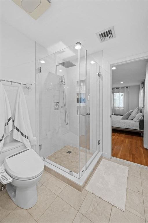 26 Sherwood Rd, Swampscott, MA 01907 - ensuite bathroom with toilet, tile patterned flooring, a stall shower, and recessed lighting
