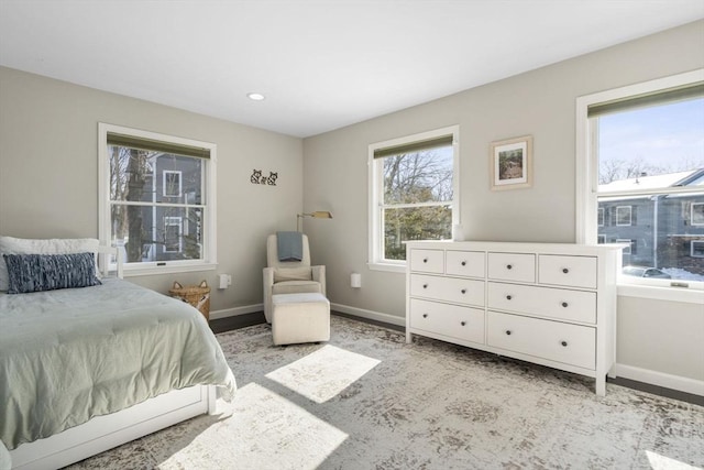 bedroom with recessed lighting and baseboards