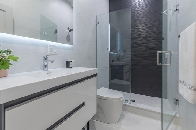 577 Masscahusetts Unit C, Boston, MA 02118 - full bathroom with toilet, vanity, a stall shower, and tile walls