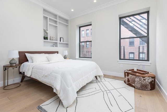 577 Masscahusetts Unit C, Boston, MA 02118 - bedroom featuring wood finished floors, baseboards, crown molding, and recessed lighting