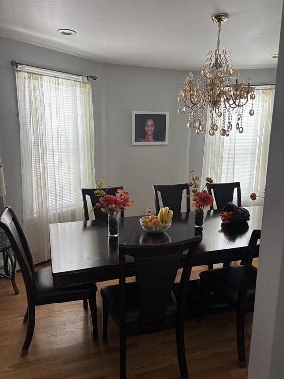 102-104 Robey St, Boston, MA 02119 - dining area with wood finished floors and a chandelier