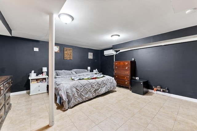 bedroom with light tile patterned floors and a wall unit AC