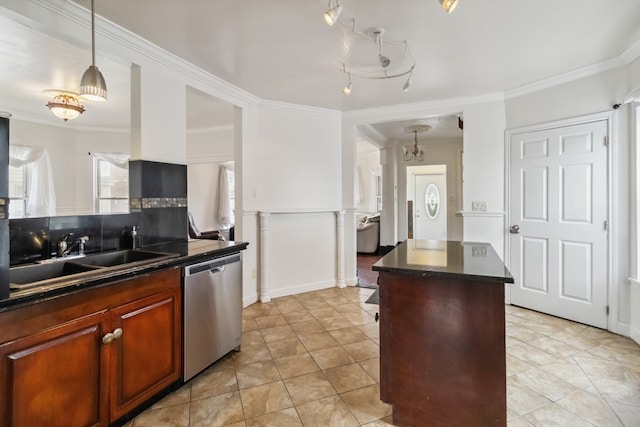 kitchen with ornamental molding, dishwasher, hanging light fixtures, and sink