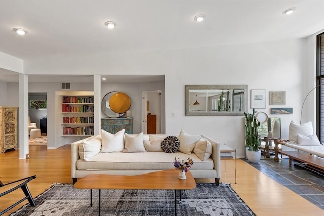 166 Quinapoxet Ln, Worcester, MA 01606 - living room featuring wood finished floors, recessed lighting, and built in features