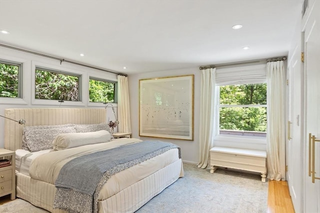 166 Quinapoxet Ln, Worcester, MA 01606 - bedroom featuring multiple windows, recessed lighting, baseboards, and light wood-style floors