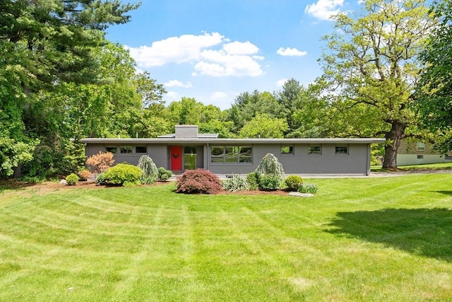 166 Quinapoxet Ln, Worcester, MA 01606 - view of front of house featuring a front yard and a chimney