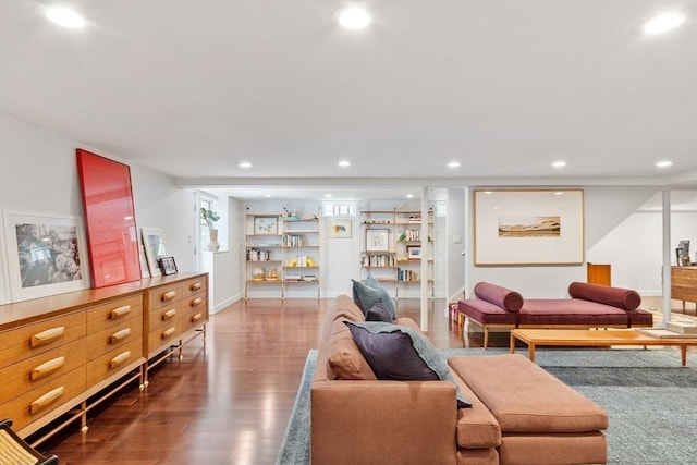 166 Quinapoxet Ln, Worcester, MA 01606 - living area with wood finished floors, recessed lighting, and baseboards