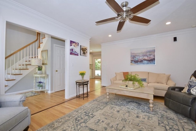 24 Sheppard Rd, Bourne, MA 02562 - living room with crown molding, wood finished floors, stairs, recessed lighting, and ceiling fan
