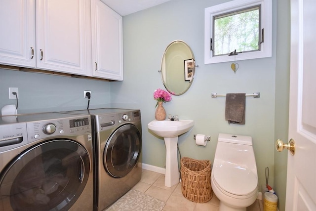 24 Sheppard Rd, Bourne, MA 02562 - washroom featuring washer and clothes dryer and light tile patterned floors