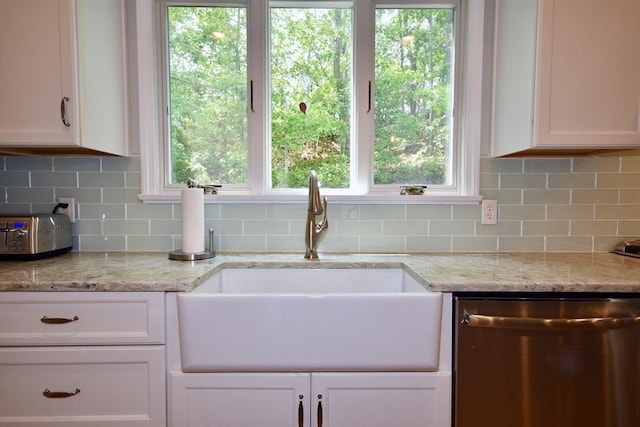24 Sheppard Rd, Bourne, MA 02562 - kitchen with dishwasher, white cabinetry, and tasteful backsplash