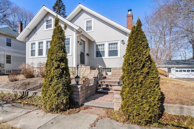 view of front of home with a chimney