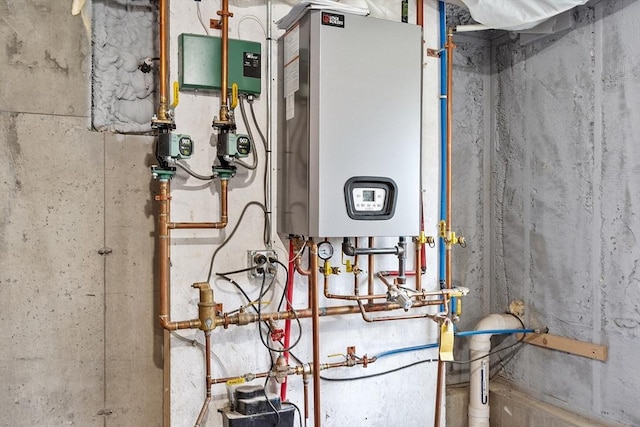 utility room with tankless water heater