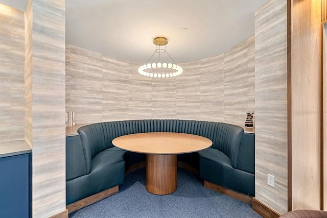 interior space with carpet floors and breakfast area