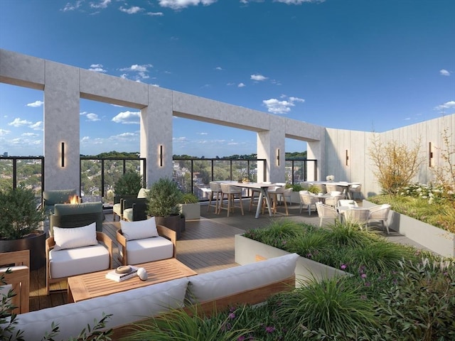 view of patio / terrace with an outdoor living space, a wooden deck, and outdoor dining area
