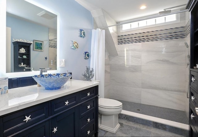 14 Lewis St, Hull, MA 02045 - full bathroom featuring tiled shower, vanity, and toilet
