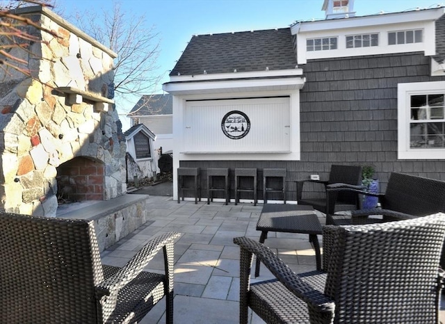 14 Lewis St, Hull, MA 02045 - view of patio / terrace featuring an outdoor living space with a fireplace