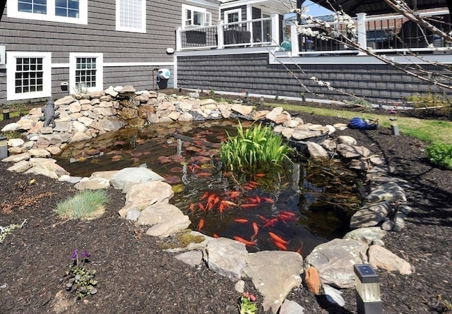 14 Lewis St, Hull, MA 02045 - view of yard with a small pond
