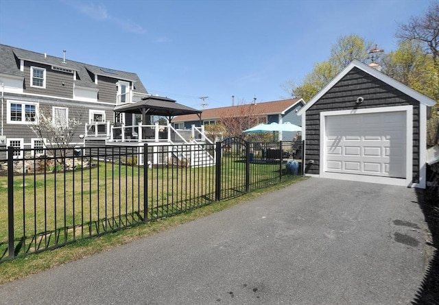 14 Lewis St, Hull, MA 02045 - view of front of property with a gazebo, a detached garage, an outdoor structure, asphalt driveway, and a shingled roof