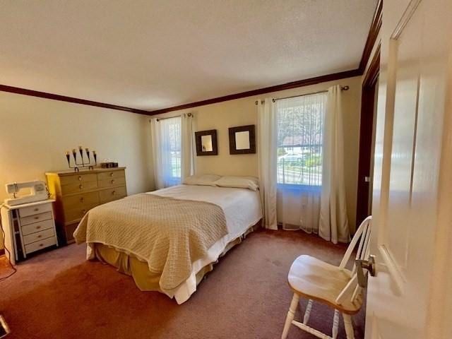 bedroom with ornamental molding, carpet, and multiple windows