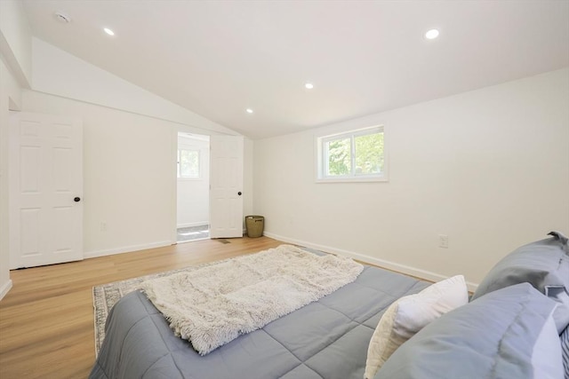 28 Custer St, Rockland, MA 02370 - bedroom featuring multiple windows, vaulted ceiling, baseboards, light wood-style floors, and recessed lighting