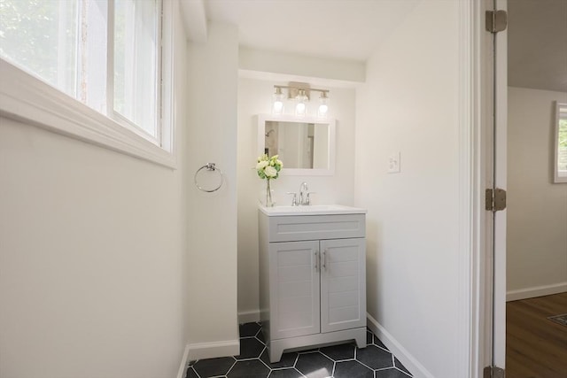 28 Custer St, Rockland, MA 02370 - bathroom with vanity, baseboards, and tile patterned flooring