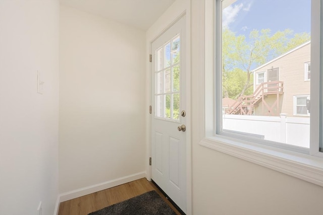 28 Custer St, Rockland, MA 02370 - doorway with wood finished floors and baseboards