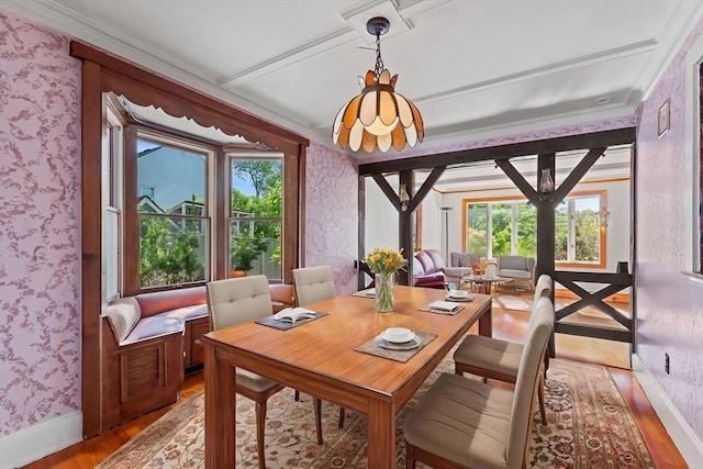 676 Salem St, Groveland, MA 01834 - dining room with wallpapered walls, light wood-style flooring, healthy amount of natural light, baseboards, and crown molding