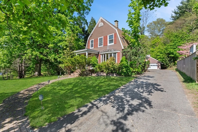 676 Salem St, Groveland, MA 01834 - dutch colonial featuring a gambrel roof, a chimney, and a detached garage