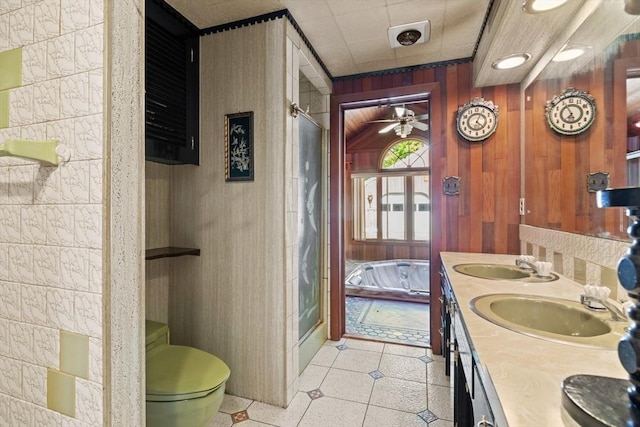676 Salem St, Groveland, MA 01834 - full bath featuring a stall shower, ceiling fan, wooden walls, double vanity, and toilet