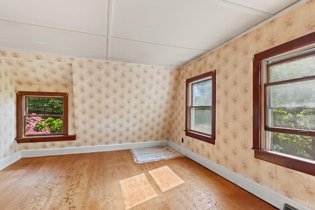 676 Salem St, Groveland, MA 01834 - spare room with wood finished floors and baseboards