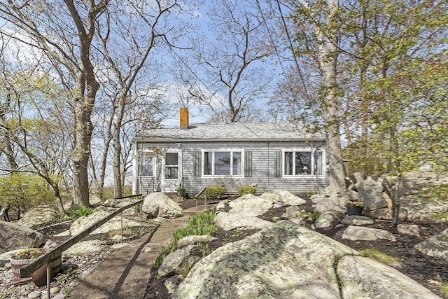 view of front of house with a chimney