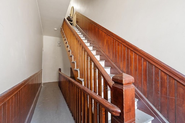 104 Pleasant St, Worcester, MA 01609 - stairway with a wainscoted wall and wooden walls