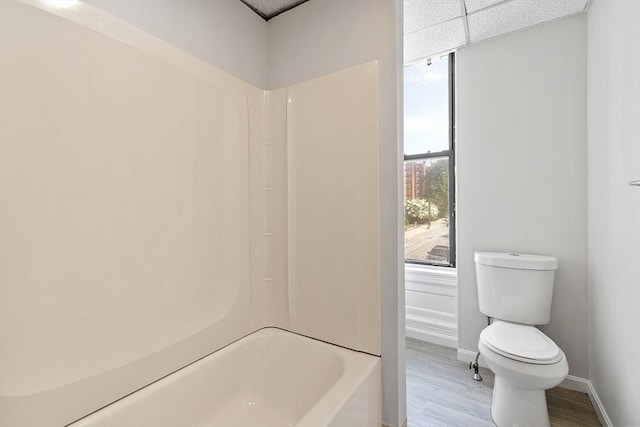 104 Pleasant St, Worcester, MA 01609 - bathroom featuring wood finished floors and tub / shower combination